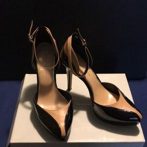 Worn Black & Tan Strap heels small scratch scuff